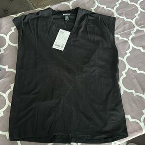 New with tags. Athleta. Outbound twist tee. Black. Size small fits like medium